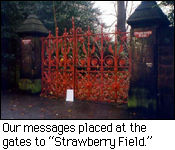 Our messages placed at the gate to Strawberry Field.