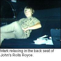 Mark relaxing in the back seat of John's Rolls Royce.